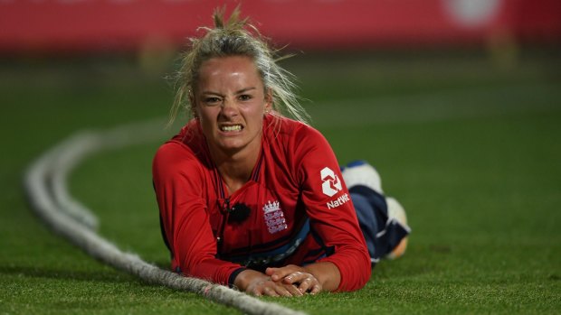 Long night: Danni Wyatt fails to stop a boundary shot from Ellyse Perry.