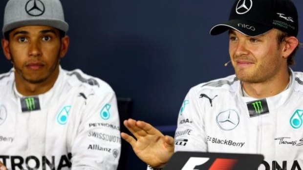 Race in two: Mercedes teammates Nico Rosberg (R) and Lewis Hamilton will start from the front row of the grid.