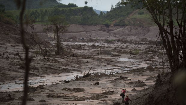 Wasteland: The Samarco dam burst unleashed huge quantities of mud and waste that destroyed a nearby village and killed 19 people in Brazil's worst environmental disaster.