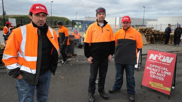 Strikers (from left) Spiros Cechris, Frank Polemicos and Trent Dunleavy on the picket line outside the Somerton warehouse.