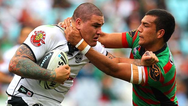 Russell Packer of the Warriors meets the Souths defence head on.