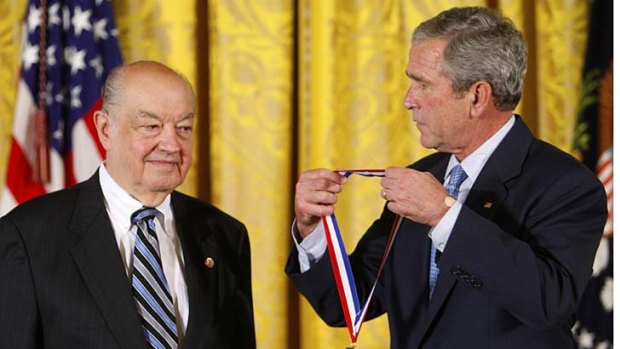 In a September 29, 2008 file photo then President Bush presents Paul Baran a 2007 National Medal of Technology and Innovation in the East Room of the White House.