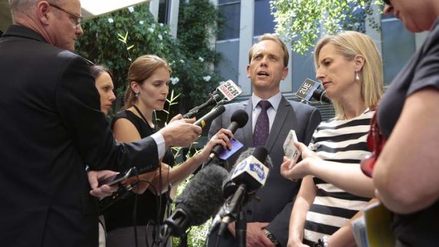 ACT Attorney General Simon Corbell MLA and Chief Minister Katy Gallagher MLA speak to the media in response to the High Court decision on the ACT's same-sex marriage laws at the Legislative Assembly.