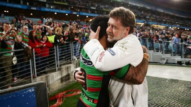 I had a dream: Russell Crowe embraces Issac Luke after the Rabbitohs win over the Roosters.