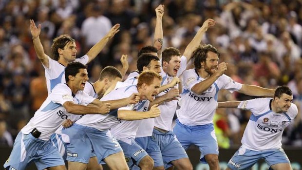 Winners ... Sydney FC players celebrate after winning the penalty shoot-out to claim the A-League grand final on March 20, 2010.