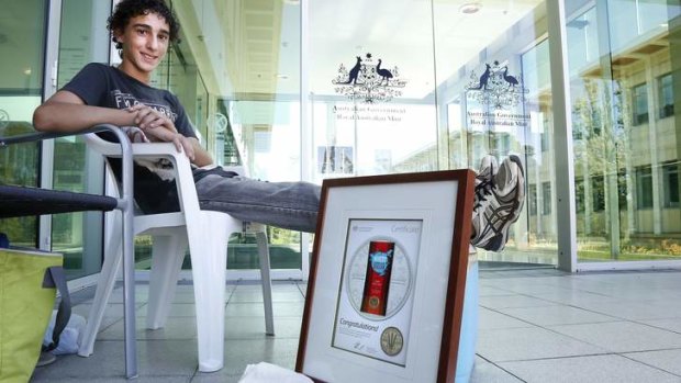 WAITING GAME: Harley Russo, 13, in line at the Royal Australian Mint in Deakin.