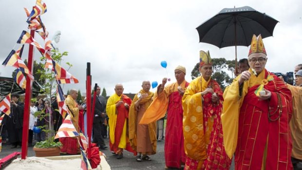Buddhists from Melbourne and around the world take part in the stone-laying ceremony at Linh Son Temple in Reservoir.