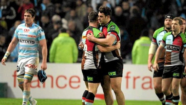 Harlequins' players celebrate after defeating Racing-Metro on Saturday in the Heineken Cup.