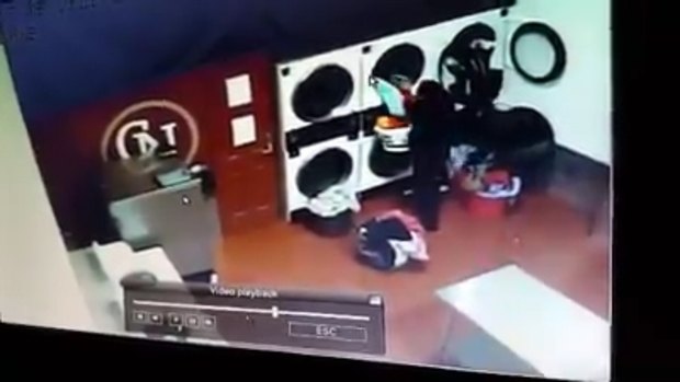 A still from the CCTV footage from Clothes on the Nose laundromat. 