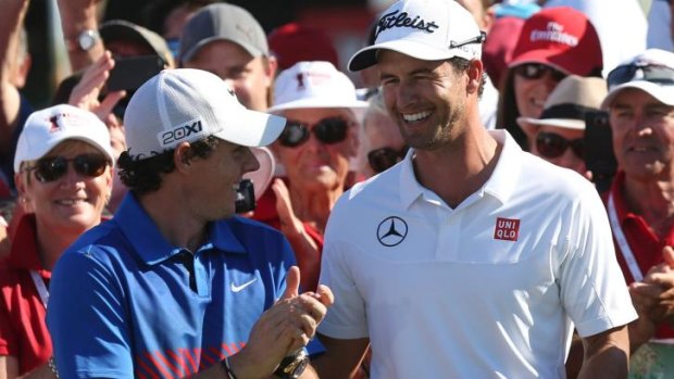 Epic battle: Rory McIlroy and Adam Scott after the 2013 Australian Open.