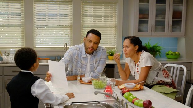 Tracee Ellis Ross (L) plays opposite Miles Brown and Anthony Anderson in season three of <i>Black-ish</i>.