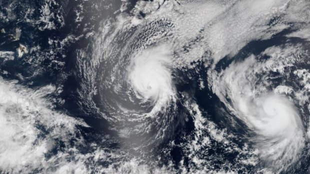 Double threat ... This NASA Rarth Observatory image shows Hurricane's Iselle (left) and Julio (right).