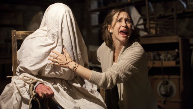 Vera Farmiga is scared sheetless in <i>The Conjuring</i>.