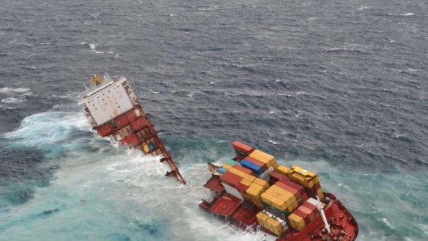 Break-up ... the cargo ship Rena, grounded off New Zealand since October, has been split into two sections that now sit 20 metres to 30 metres apart, after being lashed by pounding seas.