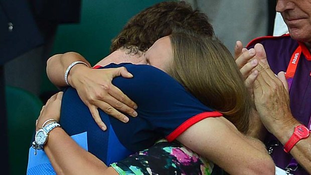 Winner ... Andy Murray hugs girlfriend Kim Sears.
