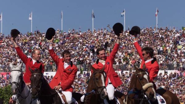 Stars of the show ... eventing team gold medalists Andrew Hoy, Phillip Dutton, Matt Ryan and Stuart Tinney at Sydney's Horsley Park in 2000.