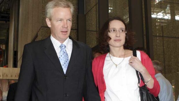 Free after three years ... Jeffrey Gilham walks out of court on Friday with his wife Robecca.