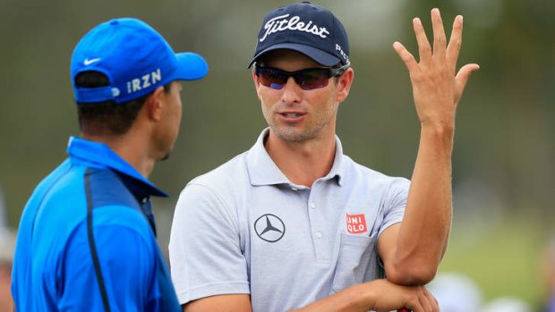 Up for grabs: Adam Scott in contention to snare the world No.1 crown from playing partner Tiger Woods.