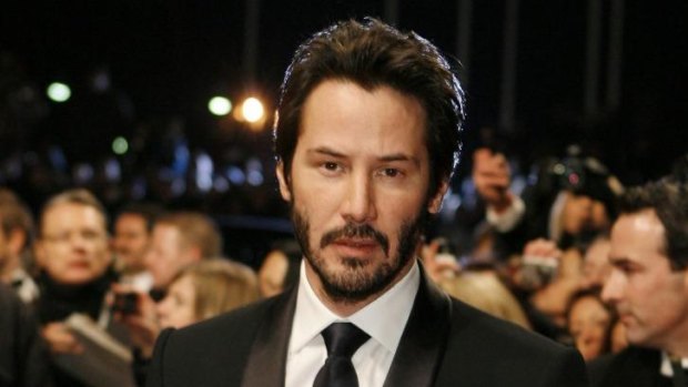 Cool customer ... Keanu Reeves may not have recommended any books in his library but had no problem chatting to the intruder.