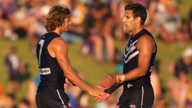 Nathan Fyfe and Matthew Pavlich at Arena Joondalup at Tuesday night’s NAB Challenge between West Coast and Fremantle.
