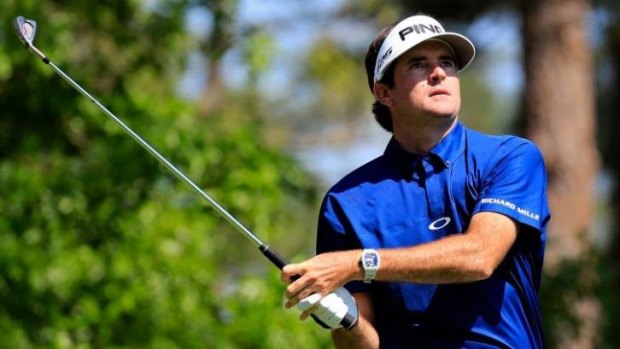 Bubba Watson dropped shots on the back nine but remains in a share of the lead.