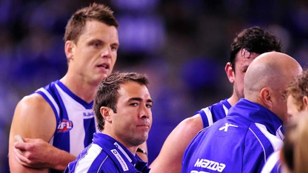 North Melbourne coach Brad Scott at quarter-time when the Roos were behind by two points.