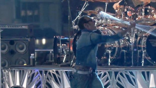 Not such a good idea ... Van Halen frontman David Lee Roth twirling a microphone stand on <i>Jimmy Kimmel Live</i>.