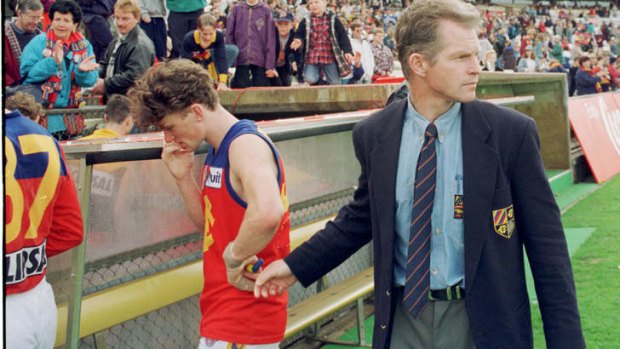 Demoralising: Alan McConnell leaves the field in 1996 after another loss.