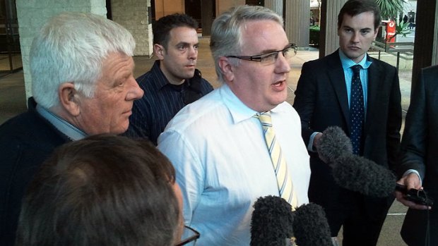 Together union leader Alex Scott, with several public servants after this afternoon's aborted meeting with Treasurer Tim Nicholls.