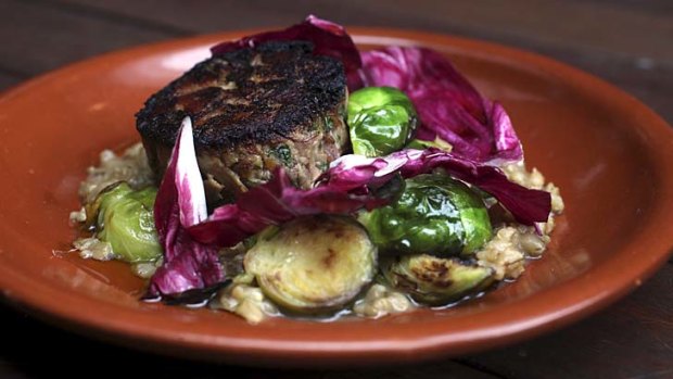 Pot roasted pork shoulder, roasted brussel sprouts, pearl barley and white onion puree.