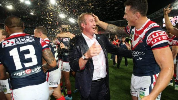 Grand old time: Roosters coach Trent Robinson and Sonny Bill Williams celebrate last year's premiership win over Manly. 