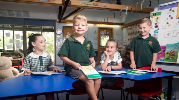 Glenorie Public School students Marlia Stewart, Knox Murray, Chloe Pratt and Cameron Trulove improve their reading skills.