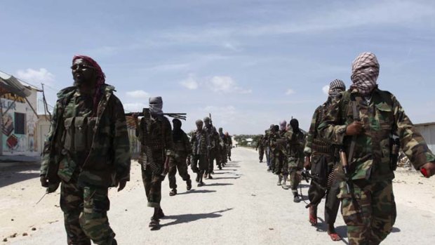 Al-Shabab soldiers on patrol in southern Mogadishu.