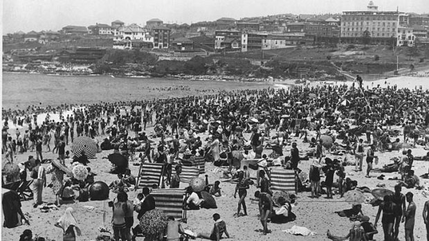 Then and now ... hot weather always brings people to Bondi Beach. On January 14, 1939, the Herald reported intense conditions.