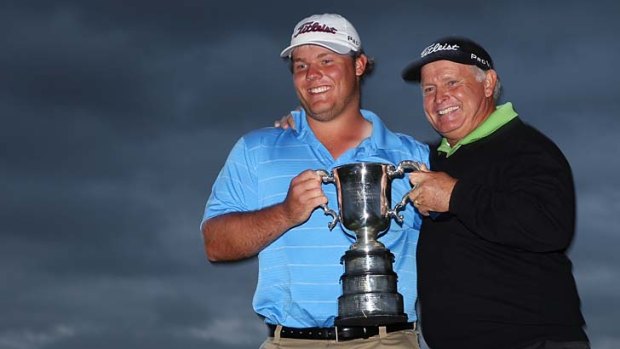 Hits and misses &#8230; Peter Senior, right, with son Mitch after his Australian Open triumph on Sunday.