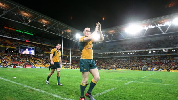 Old gold: Stirling Mortlock thanks the crowd after beating South Africa at Suncorp Stadium in 2006.