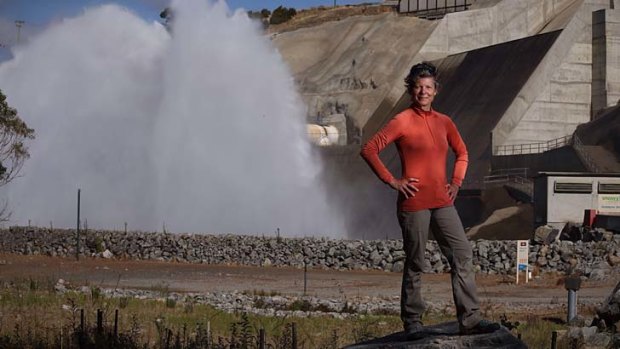 Happy returns: Acacia Rose of the activist group the Snowy Rover Alliance at the Jindabyne dam at the time of a scheduled release to the Snowy River.