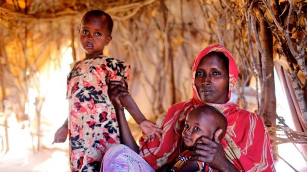 Inside Dadaab: Ladhan Waraq Yusuf, 30, with daughter Sahlan, 3, and son Weli, 1. Sahlan became severely malnourished and almost died during the Horn of Africa famine in 2011.