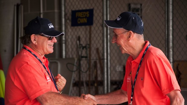 Donald McGauchie chats and shakes hands with LendLease chairman David Crawford behind the scenes at the Couta Boat Classic in 2016 in Melbourne.