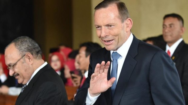 Prime Minister Tony Abbott arrives at the ceremony.