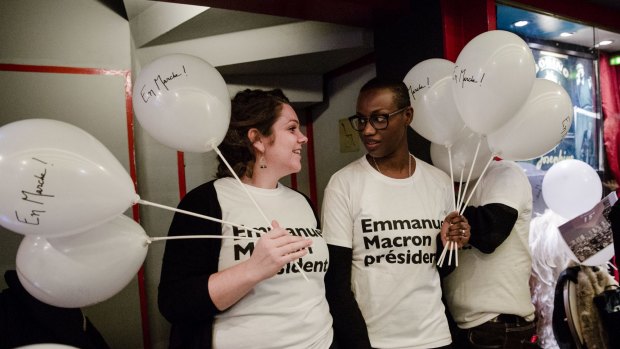 Campaign volunteers for Emmanuel Macron before the start of a campaign event in Paris.
