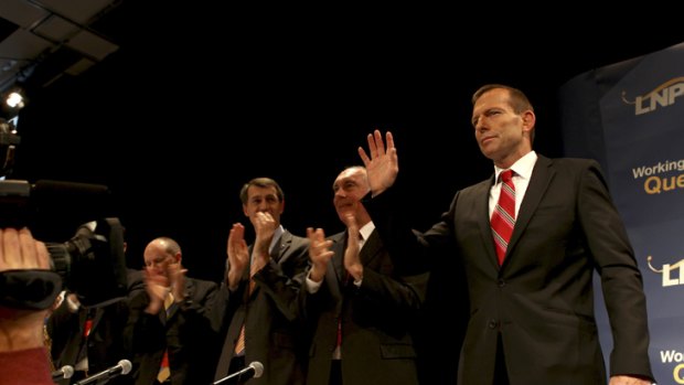 Rock-star status ...Tony Abbott, far right, with from left, Campbell Newman, Graham Quirk and Warren Truss, in Brisbane yesterday.