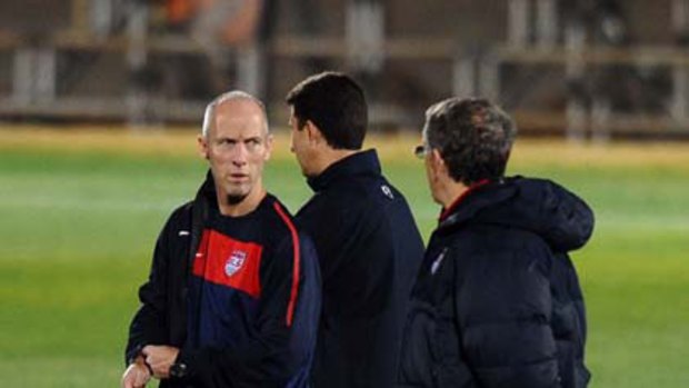US coach Bob Bradley talks to his staff during a training session at Mogwase Stadium in Rustenburg.