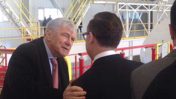 Kerry Stokes (left) talking to Qantas chief executive Alan Joyce at the opening of the airline's hangar at Los Angeles airport.