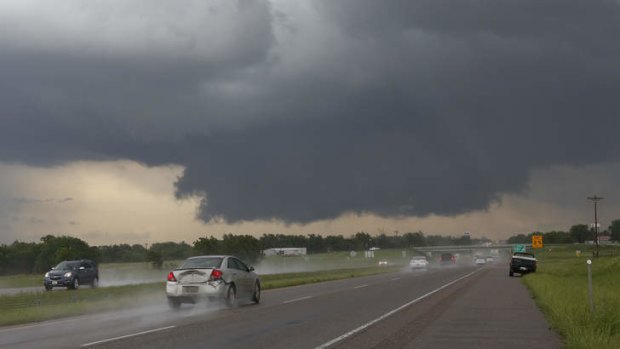 At least two tornadoes touched down in Oklahoma and another hit Arkansas on Thursday.