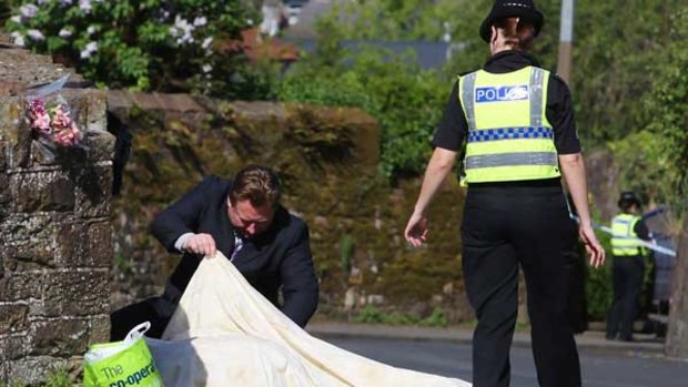 Police at the scene of one of Bird's murders, in Egremont, north-west England.