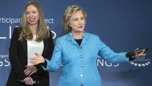 Big news: Chelsea Clinton and her mother, Hillary, at the Manhattan event where Ms Clinton, 34, announced her pregnancy to a surprised audience.