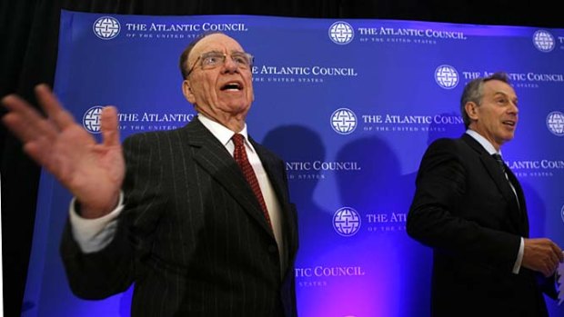 'Closest friends': Rupert Murdoch and Tony Blair in Washington three years ago.