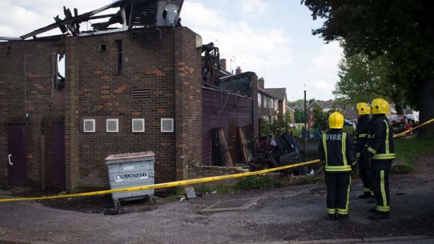 Counter-terrorism officers are investigating a suspicious fire at a Somali community centre in north London where graffiti spelling out the name of a far-right group was left on the building.