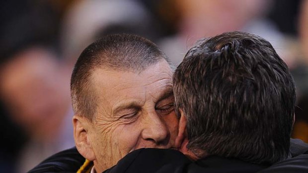 Jeff Kennett embraces Eddie McGuire after the first preliminary final on Friday.